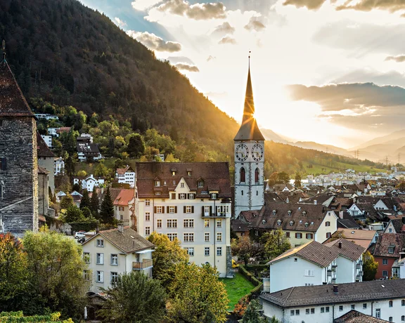 Aerial view of Chur in Switzerland with typical houses and a church.