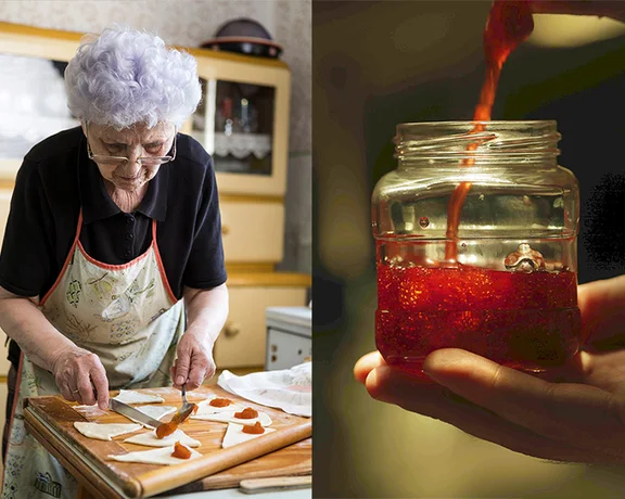 Elderly Serbian woman preparing pastries with homemade strawberry jam in her kitchen.