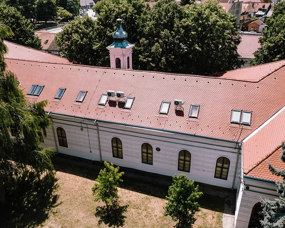 Aerial view of Valjevo, Serbia — a historic Balkan town nestled among rolling hills and river valleys, showcasing authentic Serbian heritage and European charm.