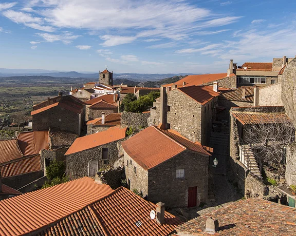 Stone houses built around giant boulders in the hilltop village of Monsanto, Portugal