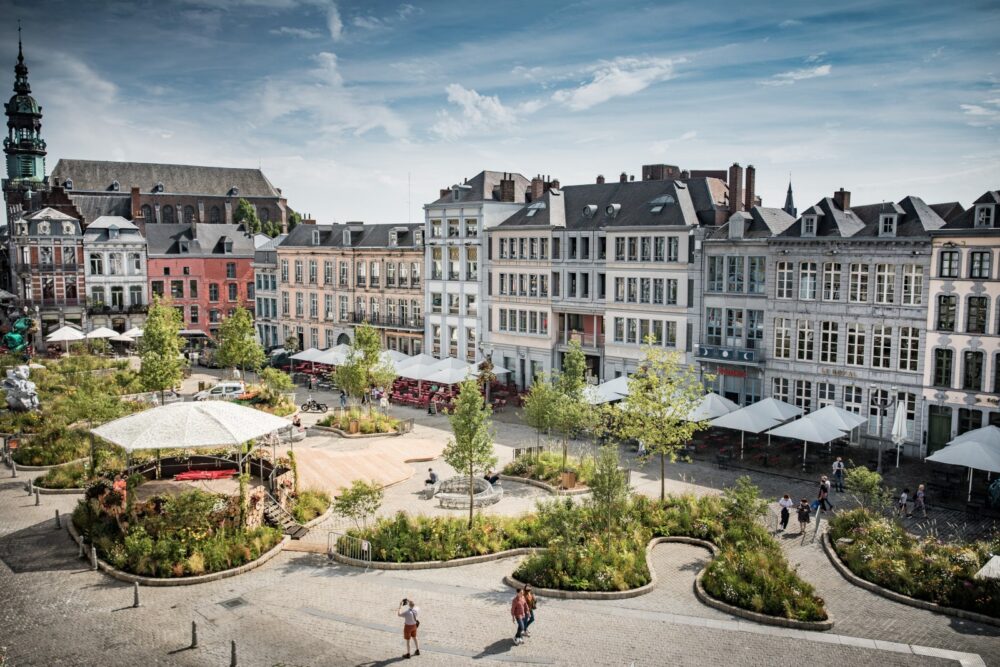 Sit with a coffee and take in Mons' Grand Place