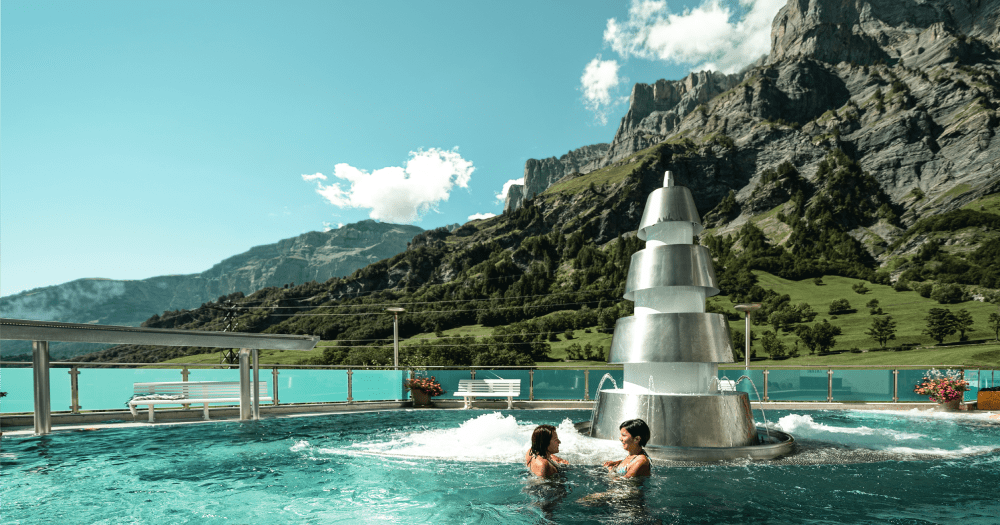 Soak up scenery and a mineral bath at Leukerbad Thermal Spa, Leukerbad © Switzerland Tourism