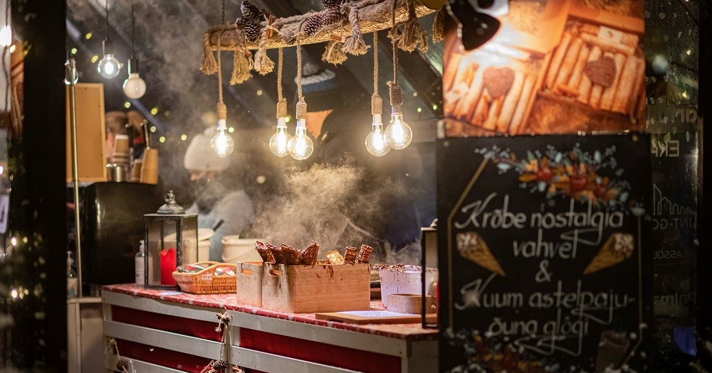 Try seasonal treats such as mulled wine and waffle cookies from vendors around the square
