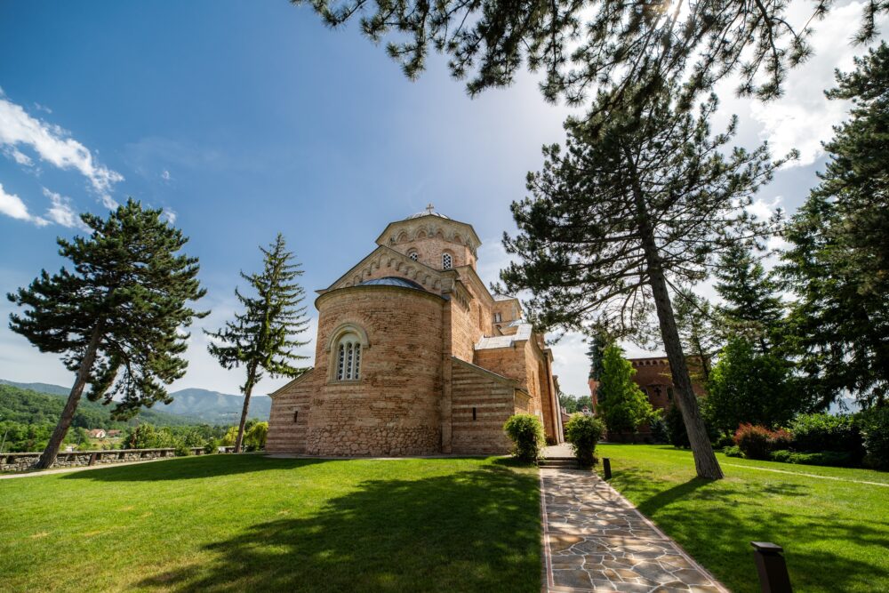 Žiča Monastery surrounded by trees in central Serbia