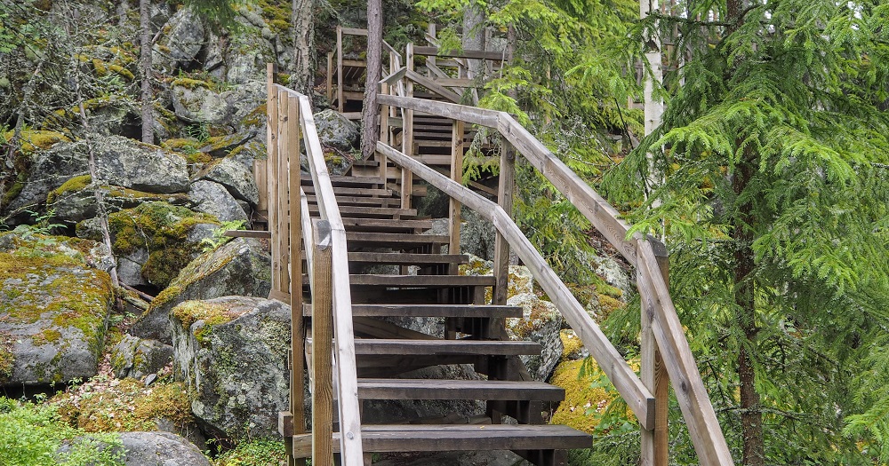 Climb up the stairs at the Oravivuori Triangulation Tower and enjoy the view of stunning landscape