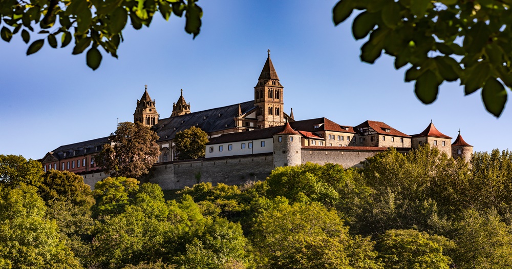 Climb the hill in Comburg to see the former Burgenstraße Benedictine monastery.