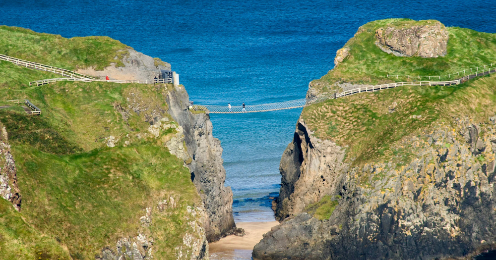 Cross the Carrick-a-Rede Rope Bridge in County Antrim for a breathtaking view.