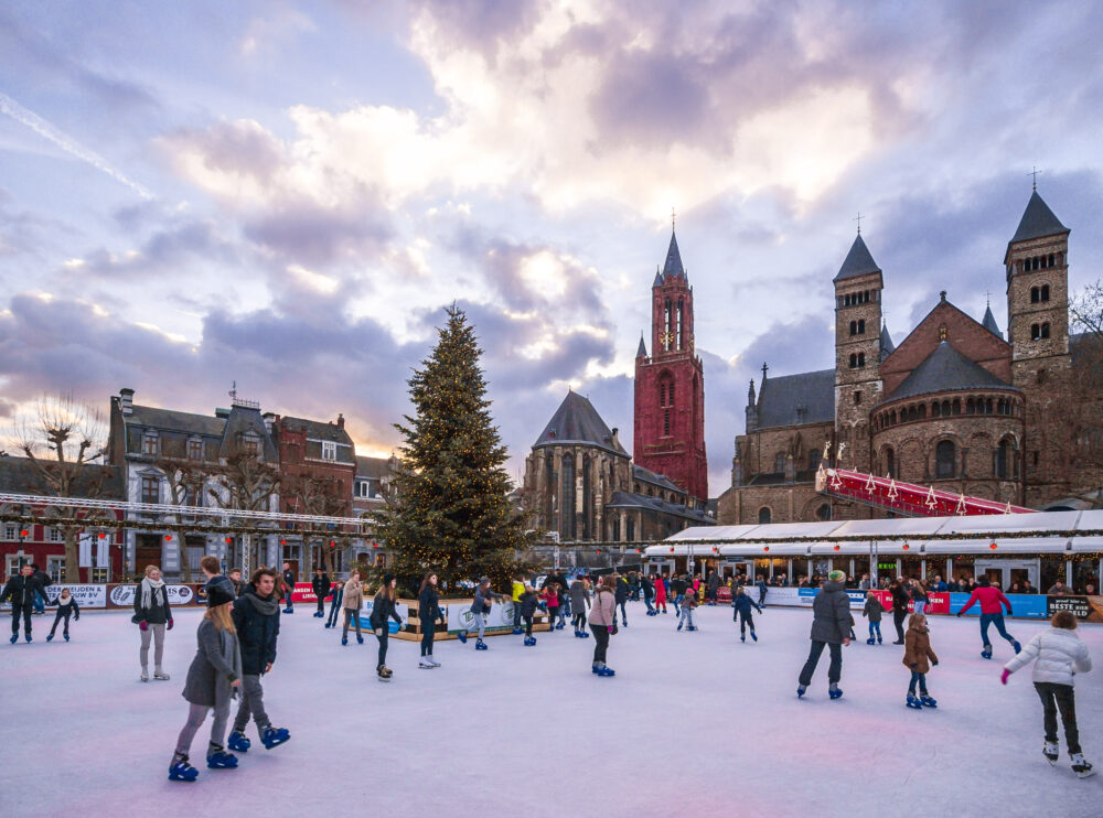 Join locals at a picturesque ice skating rink in Maastricht, the Netherlands 